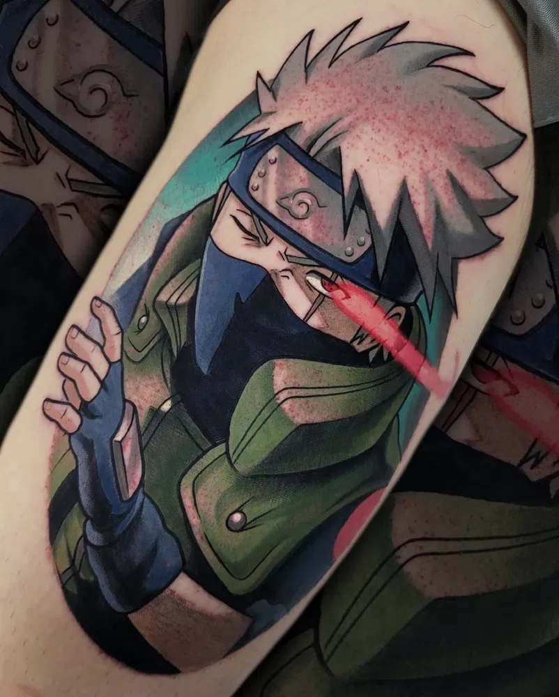 Tatuagem de anime colorida pela artista Micheila Bottin Ackerman.